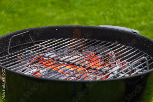 burning charcoal grill