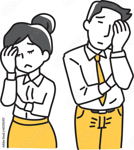 頭を抱える会社員の男女