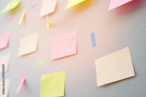 collection of colorful variety post it. paper note reminder sticky notes pin paper blue  on cork bulletin board. empty space for text.