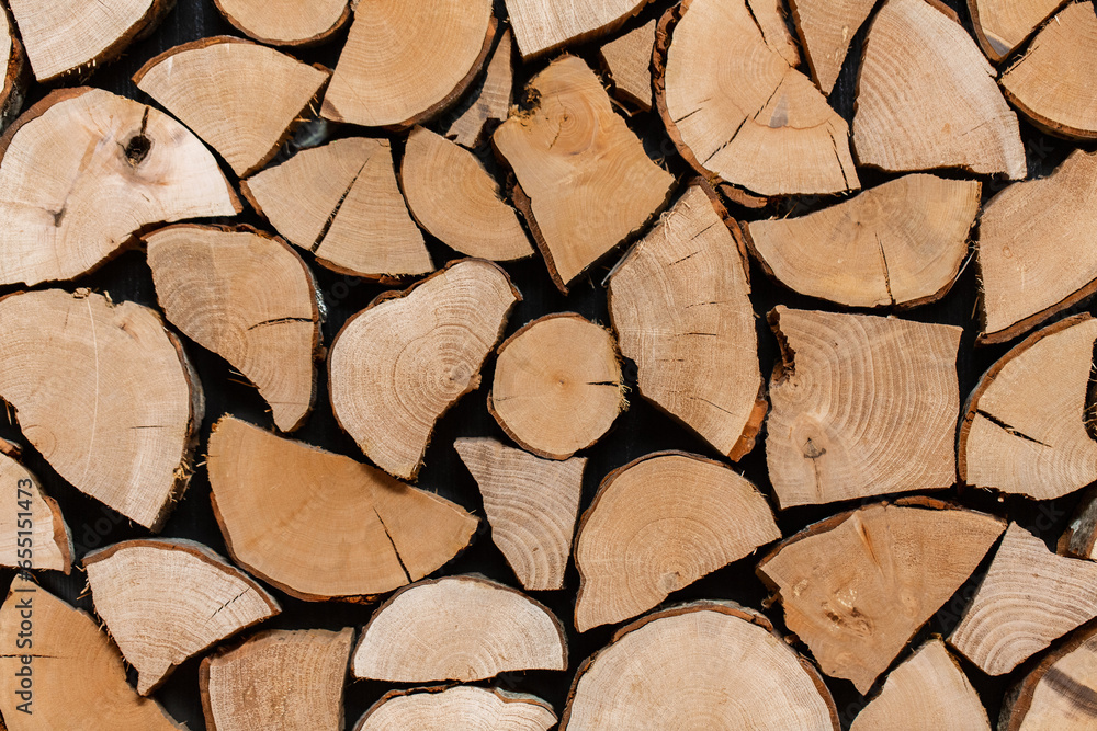 stove heating and wood fuel concept - background of stacked firewood stove heating and wood fuel concept - background of stacked firewood