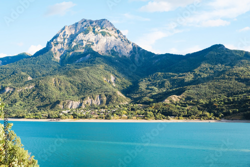 Lake of Serre-Poncon, reservoir and popular nature attraction on the border in the Provence-Alpes-Cote d'Azur region, Southeastern France.