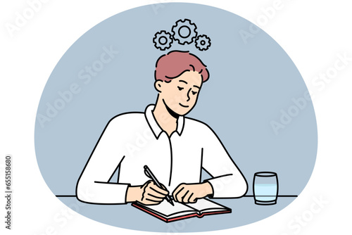 Young man sit at desk making notes in notebook generate creative ideas in head. Motivated male employee write in journal with gear mechanism above head. Vector illustration.