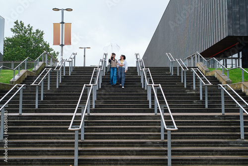 Women walking together down stairs