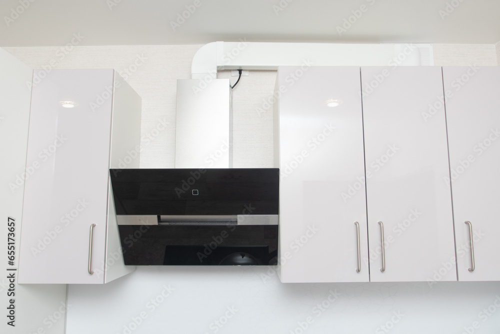 Modern kitchen in elegant house. Hood Supply Air Return - Kitchen Ventilation Systems. Modern kitchen in elegant house. Hood Supply Air Return - Kitchen Ventilation Systems.