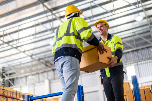 Engineer team cargo shipping transportation ship loading move inventory cardboard boxes in factory distributions warehouse at logistics center.logistic industry and business import export