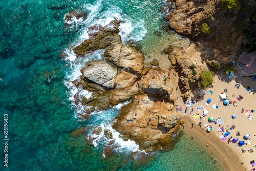 Resort town on the Mediterranean coast in Spain. Drone view of the beach in the town of Lloret De Mar. © Andreas May