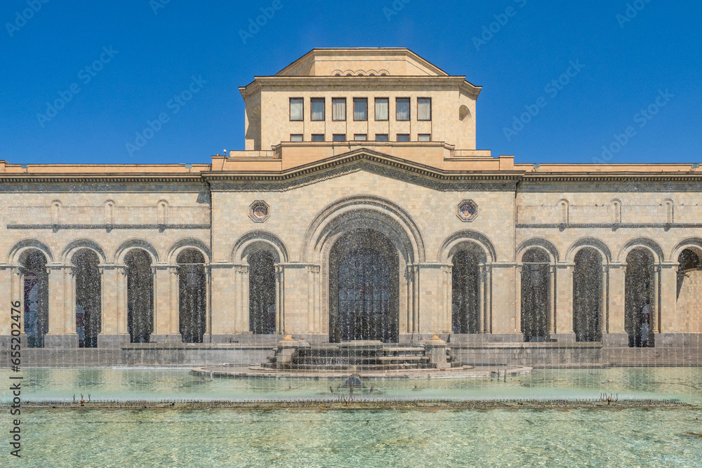 Sights of Yerevan. Architecture of Armenia. Building of national historical museum. Armenia in sunny weather. Building with fountain. National historical museum of Armenia. Travel to Yerevan