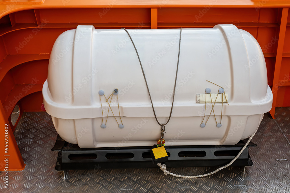 Capsule with lifeboat. Rescue equipment on ship. Ensuring safety of passengers on sea vessel. Capsule with lifeboat locked. Rescue technologies when entering open sea. Lifeboat in white hull Capsule with lifeboat. Rescue equipment on ship. Ensuring safety of passengers on sea vessel. Capsule with lifeboat locked. Rescue technologies when entering open sea. Lifeboat in white hull