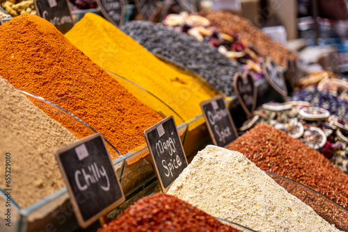 Valokuva The charm of color and aroma: A treasure trove of spices found at a bazaar