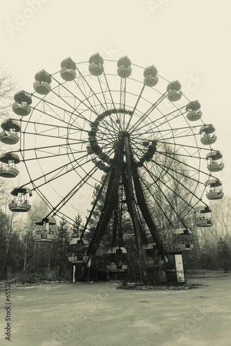 Ferris wheel in abandoned amusement park in a ghost town Pripyat, Ukraine. Chornobyl exclusion zone