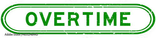 Grunge green overtime word rubber seal stamp on white background