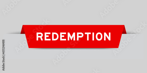 Red color inserted label with word redemption on gray background