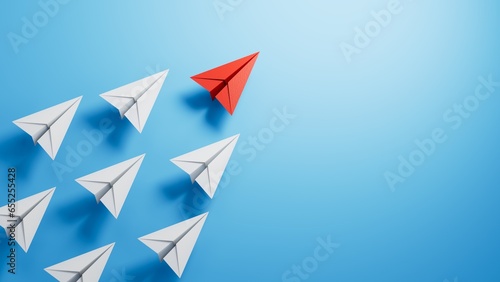 Leaderairplane concept with red paper plane leading among white.3D rendering on blue background. 