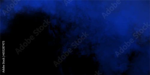 Blue smoke in dark background.Texture and desktop picture. blue texture with colorful smoke, decorative and blurry and grunge blue paper texture, Colorful blue textures for making flyer and poster.