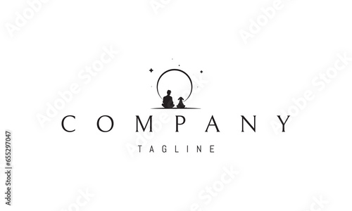 A vector logo with an abstract image of a man and a dog sitting on the beach and looking at the sunset.