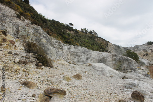 Pozzuoli, the super active volcano of the Campi Flegrei. The solfatara is the only visible mouth with its fumaroles, while the whole city suffers the effects of bradyseism. photo