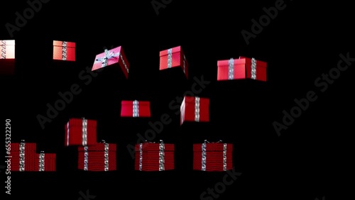 jumping and spinning christmas presents in black background. Copy space video effect for winter holiday web decoration