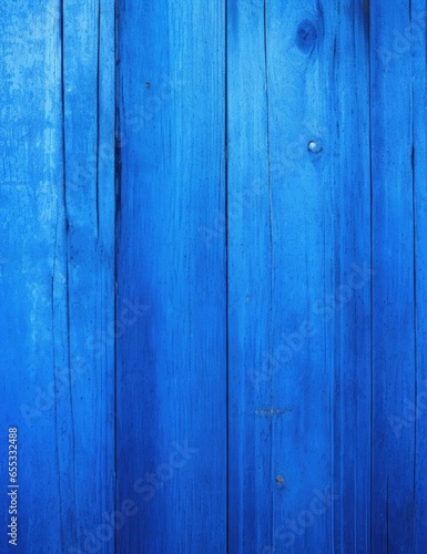Dark blue grunge background. Toned texture of old wood. Blue vintage wooden background