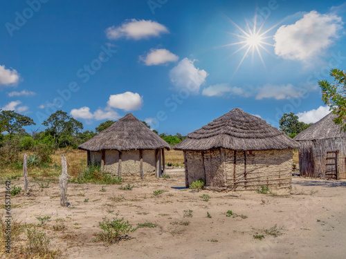 Okavango Delta in Botswana, rondavel traditional african buildings in the village , empty yard of a villager