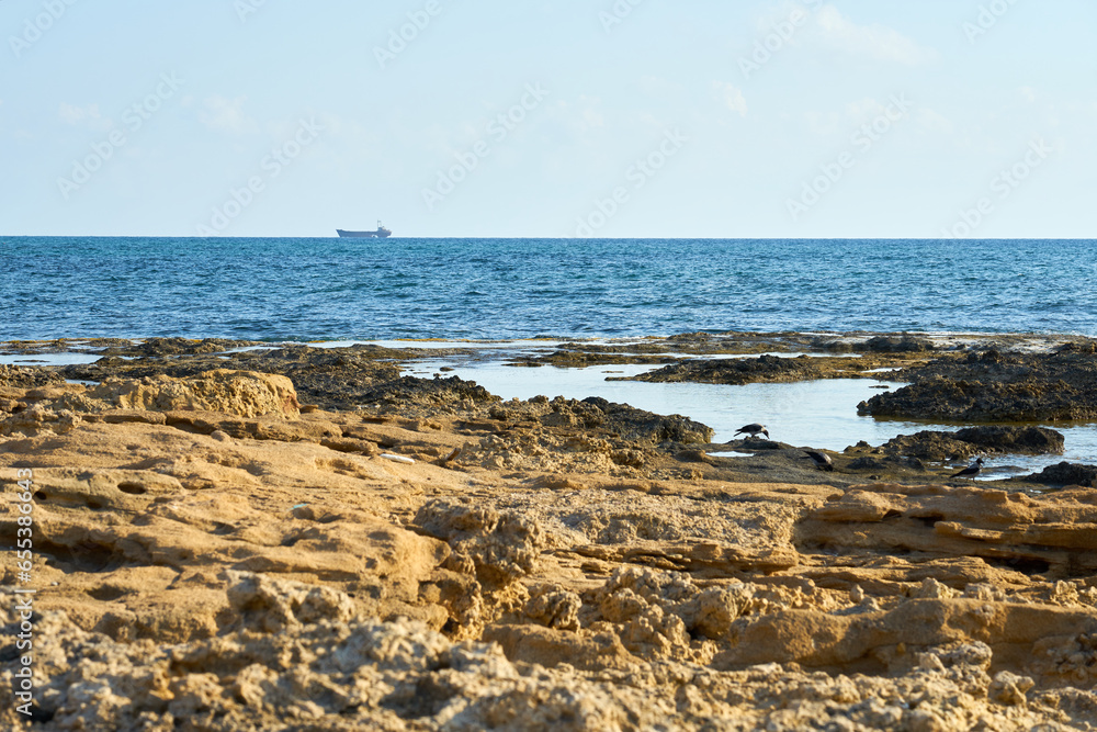 The stone coast of the Mediterranean Sea in Cyprus.