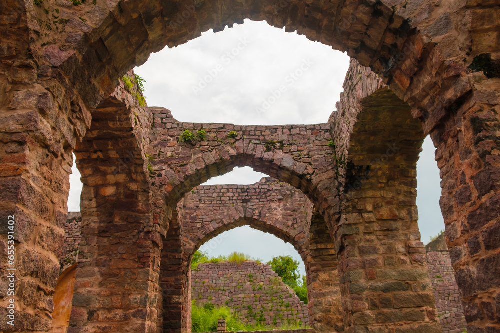 Architecture of stone pillars, arch, windows, doors of Golconda fort, Hyderabad, Telengana, India