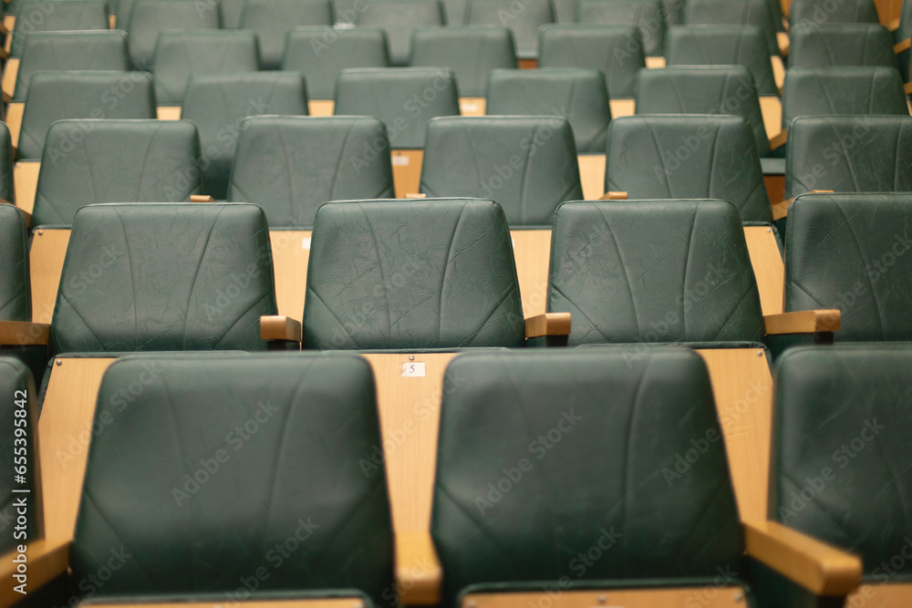Fototapeta premium Empty seats in hall. Rows of seats. Classroom for students.