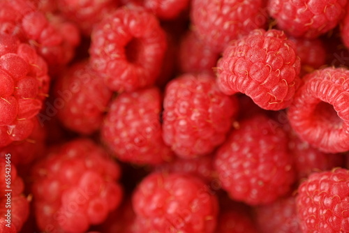 red raspberries close-up, macro juicy ripe raspberries