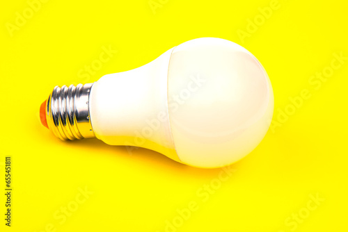 white led lamp on yellow background