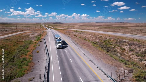 Semi-Trucks Under Blue Skies. Transportation. Trucking Business.