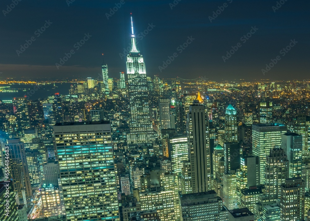 Naklejka premium Night view of New York Manhattan during sunset