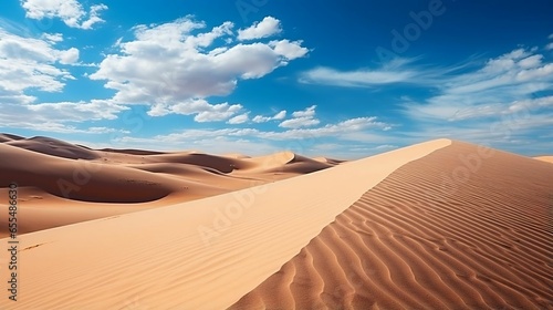 Endless Desert Sand Dunes Under Clear Blue Sky