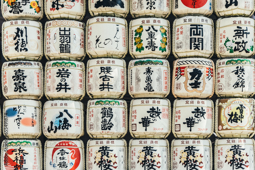 Traditional japanese wooden barrels of sake.