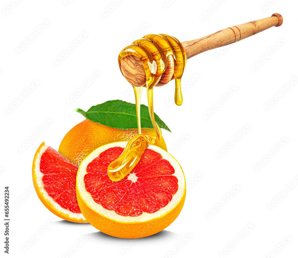 dripping honey on grapefruit isolated on white background dripping honey on grapefruit isolated on white background