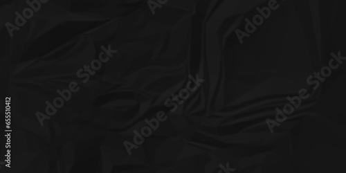 Dark crumple black fabric paper wrinkled poster template ,blank glued creased paper texture background. black paper crumpled backdrop background. used for cardboard and clarkboard.
