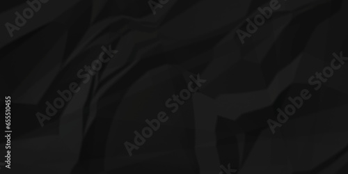 Dark crumple black fabric paper wrinkled poster template ,blank glued creased paper texture background. black paper crumpled backdrop background. used for cardboard and clarkboard.