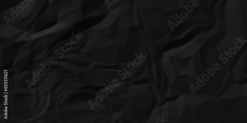 Dark crumple black fabric paper wrinkled poster template ,blank glued creased paper texture background. black paper crumpled backdrop background. used for cardboard and clarkboard.