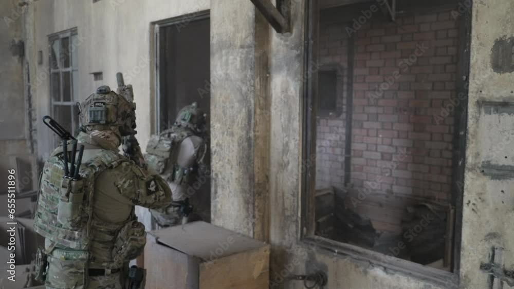 Soldier in civil war, ruined building. Close quarter battle and civil war concept. Soldier in civil war, ruined building. Close quarter battle and civil war concept.