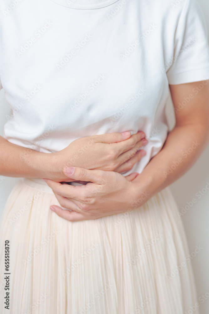 Woman having abdomen pain. Stomach, Ovarian and Cervical cancer, Cervix disorder, Endometriosis, Hysterectomy, Uterine fibroids, Reproductive, menstruation, diarrhea, digestive system and Pregnancy