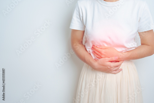 Woman having abdomen pain. Stomach, Ovarian and Cervical cancer, Cervix disorder, Endometriosis, Hysterectomy, Uterine fibroids, Reproductive, menstruation, diarrhea, digestive system and Pregnancy