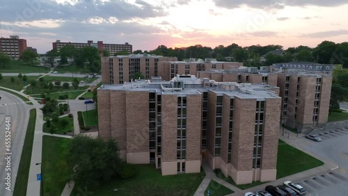 College dorms on University of Kansas campus during sunset. Aerial establishing shot of housing for college students. photo