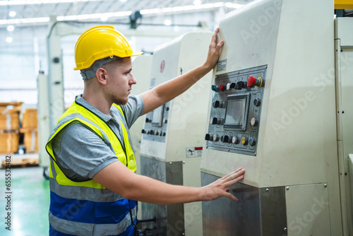 professional technician engineer with safety helmet hard hat working in industrial manufacturing factory, men at work to checking equipment of machinery production technology or construction operating