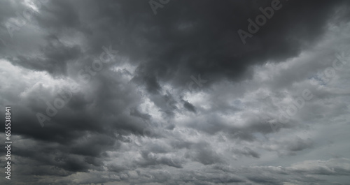 Fototapeta Naklejka Na Ścianę i Meble -   Dark sky with stormy clouds. Dramatic sky rain,Dark clouds before a thunder-storm.