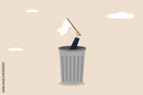Giving up, business failure, failed businessman, work mistakes or failed business concept, quitting work or giving up, businessman hand holding a white surrender flag from inside a trash can.