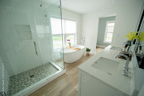 Modern bathroom in gray and white hues showcasing sleek design