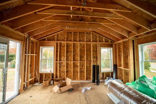 Fotografija Construction phase room, highlighted by a sliding glass door feature