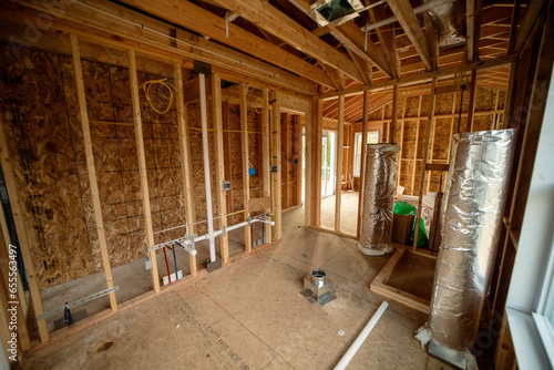 Фотография Home in early construction phase: bare stick frame room on display