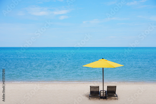 Beautiful beach, chairs on the sand near the sea, summer vacation and vacation concept for tourism.