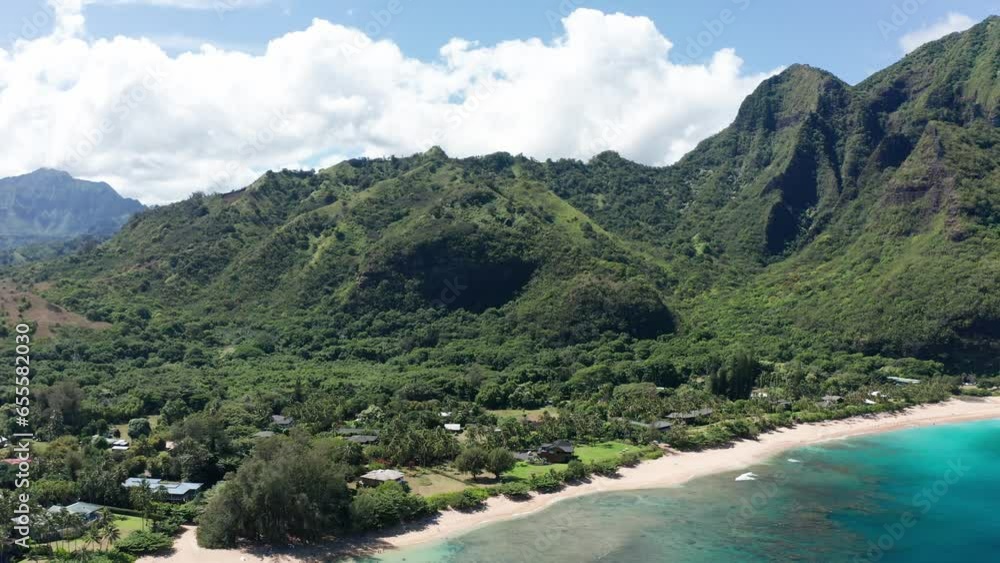 Reverse panning aerial shot of pristine Haena Beach on the island of Kaua'i in Hawai'i. 4K Reverse panning aerial shot of pristine Haena Beach on the island of Kaua'i in Hawai'i. 4K