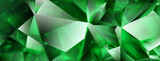 Abstract crystal background in green colors with highlights on the facets and refracting of light