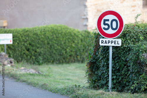 French road sign indicating 50 km per hour speed limit photo